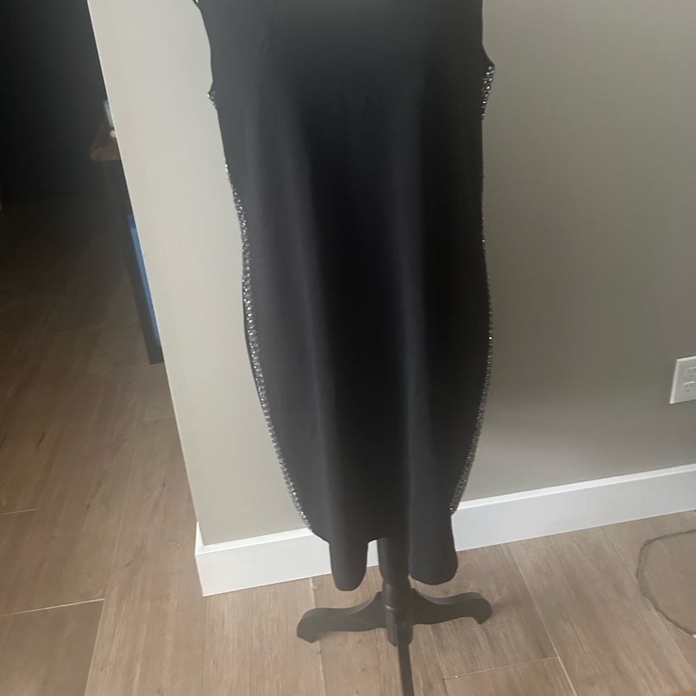 Calvin Klein black dress with bling on sides.